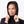 Woman wearing a black Mobile Warming hooded jacket