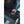 Person holding a Mobile Warming battery pack connected to a heated glove