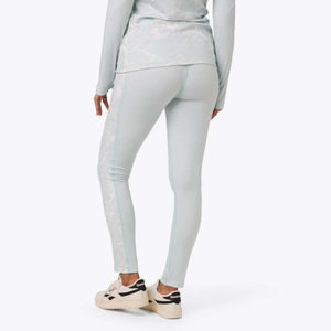 Mobile Warming light blue leggings with side panel pattern worn with matching long sleeve top and white sneakers
