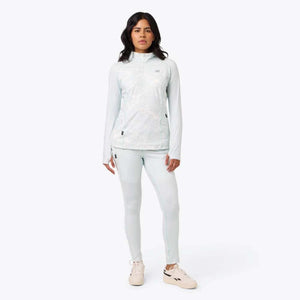 Model wearing Mobile Warming light blue quarter zip top and matching leggings