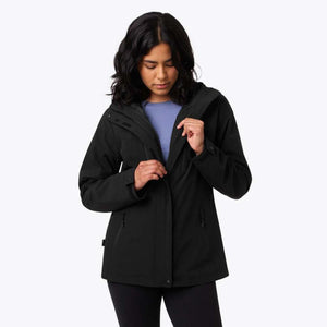 Woman wearing a black Mobile Warming hooded jacket