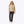 Woman wearing a beige Mobile Warming hooded sherpa fleece jacket with black zipper and dark jeans