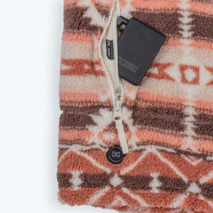 Mobile Warming battery pack inside a patterned fleece pocket