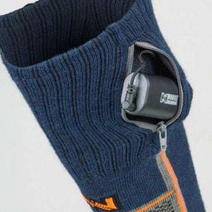 Mobile Warming battery pack inside a zippered pocket on a blue knit sock
