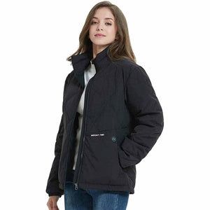 Woman wearing a black Mount Tec quilted puffer jacket with a high collar