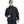 Man wearing a black quilted Mount Itos jacket over a grey turtleneck sweater