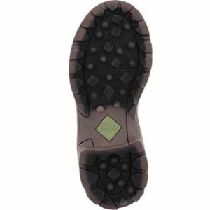 Bottom view of a Muck boot showing the treaded rubber outsole