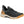 Muck lace up sneaker with grey knit upper black rubber overlay and tan heel and sole