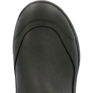 Black rubber toe cap of a Muck boot