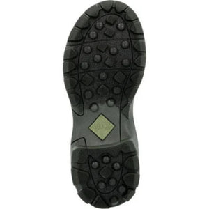 Black rubber treaded outsole of a Muck boot