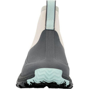 Back view of a Muck ankle boot with grey rubber base and light blue pull tab