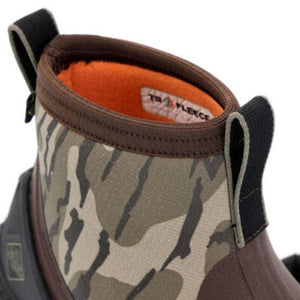 Muck camouflage boot collar with orange fleece lining and pull tabs