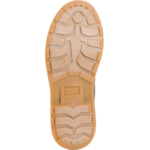 Tan rubber lug sole of a Muck boot