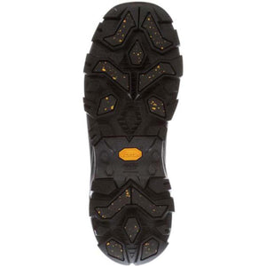 Black Vibram Arctic Grip boot outsole with yellow traction lugs