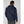 Back view of a person wearing a navy Helly Hansen hooded rain jacket