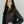 Woman wearing a black California Heat zip up jacket