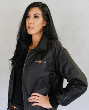 Woman wearing a black California Heat zip up jacket