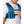 Person wearing a blue Nathan hydration vest with a straw