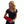Woman wearing a red Nature Creation heating pad on her forearm