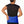 Man wearing a blue Nature Creation hot and cold therapy wrap around his lower back