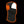 Black heated balaclava with glowing orange heating element on the side