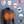 NexGen heated shirt showing seven hour battery life, three heat settings, tri-zone heating, and machine washable fabric