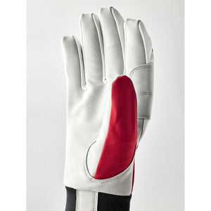 White and red athletic glove with black cuff