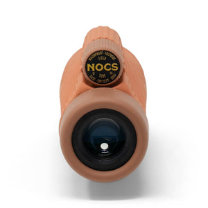 Nocs Provisions Field Tube monocular in orange viewed from the eyepiece