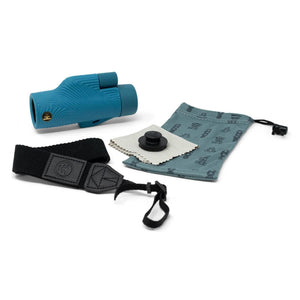 NOCS Provisions blue monocular with black wrist strap, cleaning cloth, and drawstring storage pouch