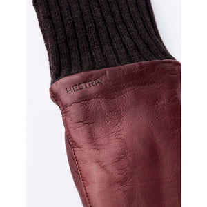 Hestra burgundy leather glove with ribbed knit cuff