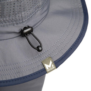 Close up of grey Mission bucket hat with adjustable toggle and logo tag