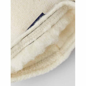 Close up of Hestra glove cuff showing cream wool lining and stitching