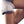 FlexiFreeze ice pack secured with a white elastic strap around a human knee