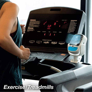 Ontel portable fan attached to a treadmill console while a person runs