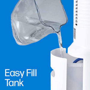 Water being poured from a clear container into the white tank of an evaporative cooler