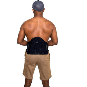 Person wearing an Onyx black lumbar support brace on their lower back