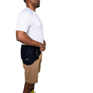 Man wearing a black Onyx Cool hip wrap over brown shorts