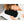 Person sleeping on a white pillow with an Onyx Cool black cooling pad