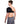 Person wearing a black Onyx shoulder ice wrap with adjustable straps