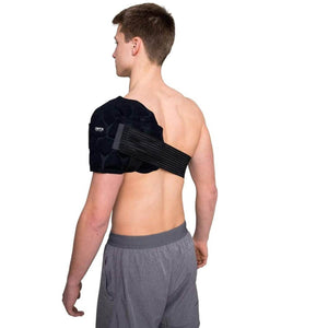 Person wearing a black Onyx shoulder ice wrap with adjustable straps
