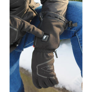 Person pointing to the power button on a black ActionHeat heated glove
