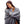 Woman wrapped in a grey ActionHeat fleece blanket