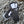 Aheata black and white heated mittens on snowy ground