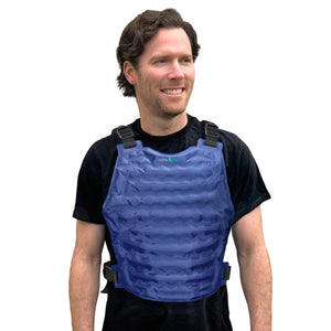 Man wearing a blue AlphaCool cooling vest over a black t-shirt