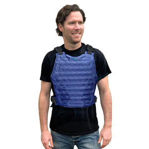 Man wearing a blue AlphaCool cooling vest over a black t-shirt