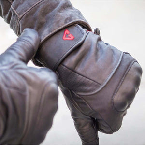 Black leather motorcycle glove with red logo on the wrist strap