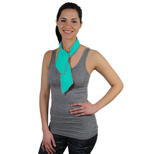 Woman wearing a turquoise AlphaCool cooling neck scarf