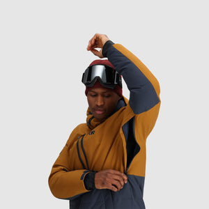 Person wearing Outdoor Research jacket with underarm ventilation zipper open