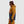 Person wearing an Outdoor Research colorblocked hooded jacket with a Smith beanie and goggles