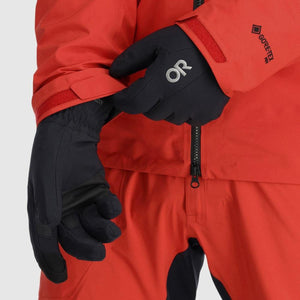 Outdoor Research black gloves worn with a red Gore-Tex Pro jacket